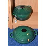 TWO GREEN LE CREUSET COVERED OVEN DISHES, both with twin handles