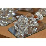 FOUR SWAROVSKI CRYSTAL ANIMALS/FLOWERS, FLUTES, comprising 'Bald Eagle', on branch, No 248003,