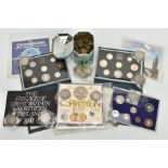 A BOX AND TIN OF COINS to include a five Franc Leopold 1st dot above date, similar 1851 coin, a
