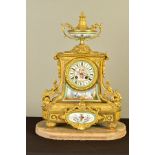 A MID 19TH CENTURY ORMOLU AND PORCELAIN MOUNTED MANTEL CLOCK, the case surmounted by a twin