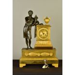 A MID/LATE 19TH CENTURY BRONZE AND ORMOLU FIGURAL MANTEL CLOCK, bronze male Classical figure holding