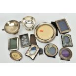 A SELECTION OF SILVER PHOTO FRAMES AND ITEMS, to include nine photo frames, such as a plain polished