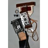 A MINTOLA AUTOCORD TLR CAMERA with 75mm Rokkor lenses and a Wirgin Stereo film camera in leather