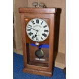 AN EARLY 20TH CENTURY OAK CASED BLICK TIME RECORDERS LTD CLOCK, of plain rectangular form with