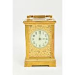 A BRASS CASED STRIKING CARRIAGE CLOCK, enamel dial within floral detail, the movement striking on