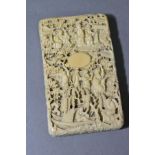 A 19TH CENTURY CHINESE CANTON CARVED IVORY CARD CASE, of rectangular form, pull off cover, vacant