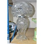 A MID 20TH CENTURY CUT GLASS TABLE LAMP, having a baluster shaped body and mushroom cap shade,