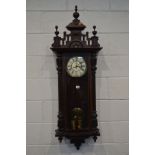 A LATE VICTORIAN MAHOGANY GUSTAV BECKER VIENNA WLL CLOCK, the 7'' dial with Roman numerals,