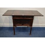 A MAHOGANY SOFA TABLE, with two drawers, double cupboard doors, above fretwork panels, on brass