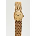 A MID TO LATE 20TH CENTURY 9CT GOLD BUECHE GIROD LADIES WRISTWATCH, an oval case measuring 23mm x