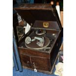 A HMV OAK CASED TABLE TOP GRAMAPHONE, the interior has corrosion, in poor condition overall