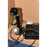 A REWORKED CANDLESTICK TELEPHONE, cast iron base, brass dial, brass and bakelite earpiece, brass