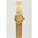 A MID TO LATE 20TH CENTURY 9CT GOLD ROAMER LADIES WRISTWATCH, the round case measuring 19mm in