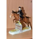 A BESWICK HUNTSWOMAN, No 982, (back legs broken)