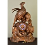 A LATE 19TH CENTURY BLACK FOREST CARVED WALNUT MANTEL CLOCK, with two near life size cock