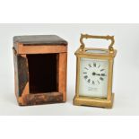 A FRENCH BRASS GLASS SIDED CARRIAGE CLOCK, dial signed Vray Son & Perry , 38 New Street,