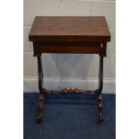 A VICTORIAN ROSEWOOD WORK TABLE, the fold over tope enclosing chess and backgammon boards, single