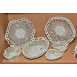 A GROUP OF BELLEEK BASKET WEAVE, comprising oval shaped bowl, length 25cm, a heart shaped dish,