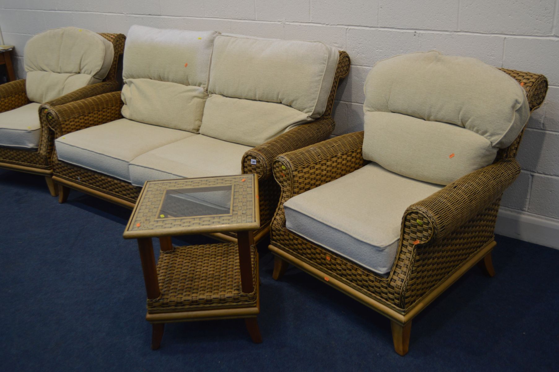A FOUR PIECE CONSERVATORY SUITE, cream cushions, comprising a two seat settee, two armchairs and - Image 3 of 4