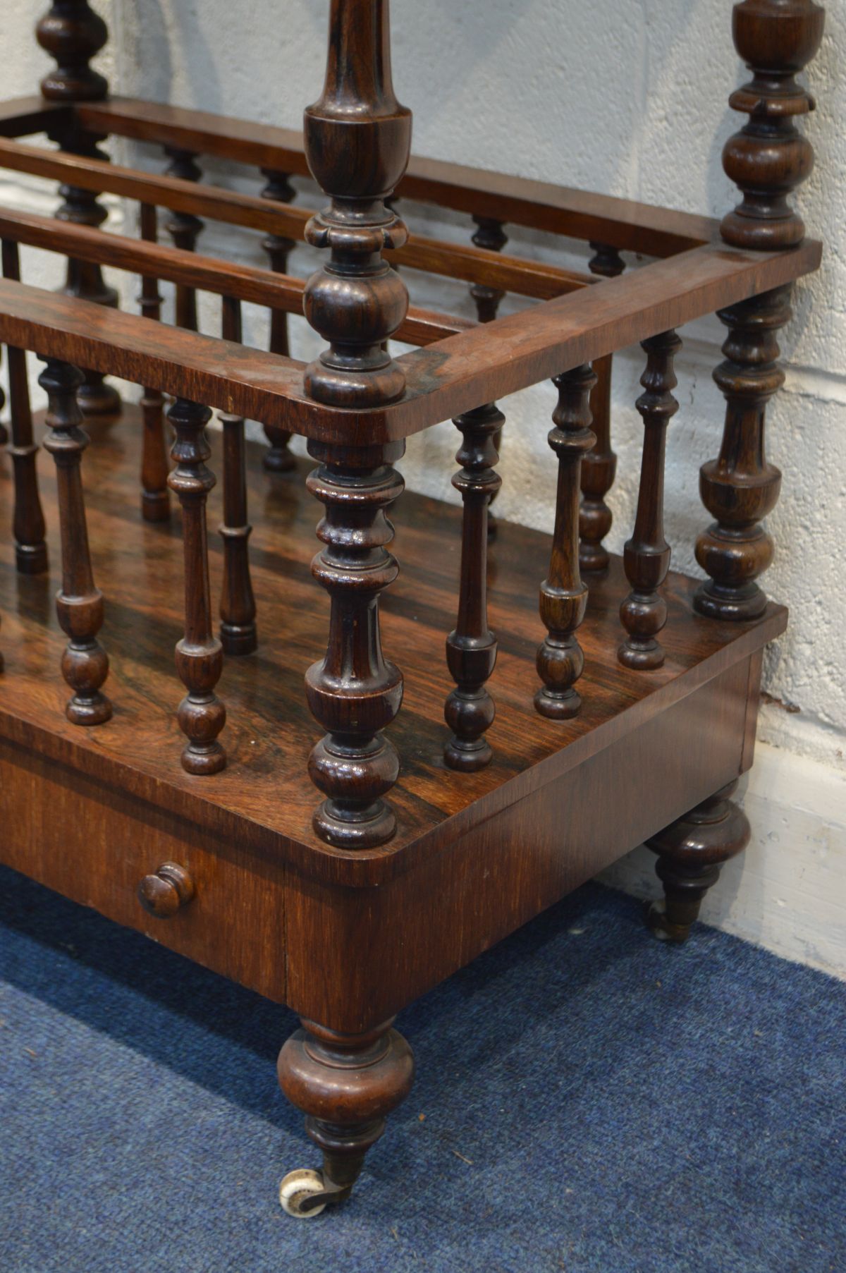 A VICTORIAN ROSEWOOD CANTERBURY, with a gallery top, turned and fluted supports, three divisions - Image 3 of 3