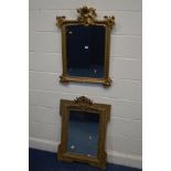 AN EARLY 19TH CENTURY FOLIATE GILT WOOD WALL MIRROR, 87cm x 61cm and a foliate gilt on plaster