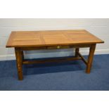 A MODERN GOLDEN OAK PLANK TOP TABLE, with a single frieze, chamfered legs united by a H stretcher,
