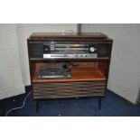 A VINTAGE GRUNDIG COMO 3/GB RADIOGRAM in a polished walnut effect case (PAT fail but working)