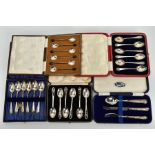 FIVE CASED SETS OF CUTLERY, to include a six piece set of silver coffee spoons with coffee bean