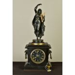 A LATE 19TH CENTURY BLACK SLATE AND BRONZE FIGURAL MANTEL CLOCK, surmounted by a bronze figure of