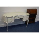 A CREAM AND GILT KIDNEY DRESSING TABLE (no mirrors) and an oak bureau (2)