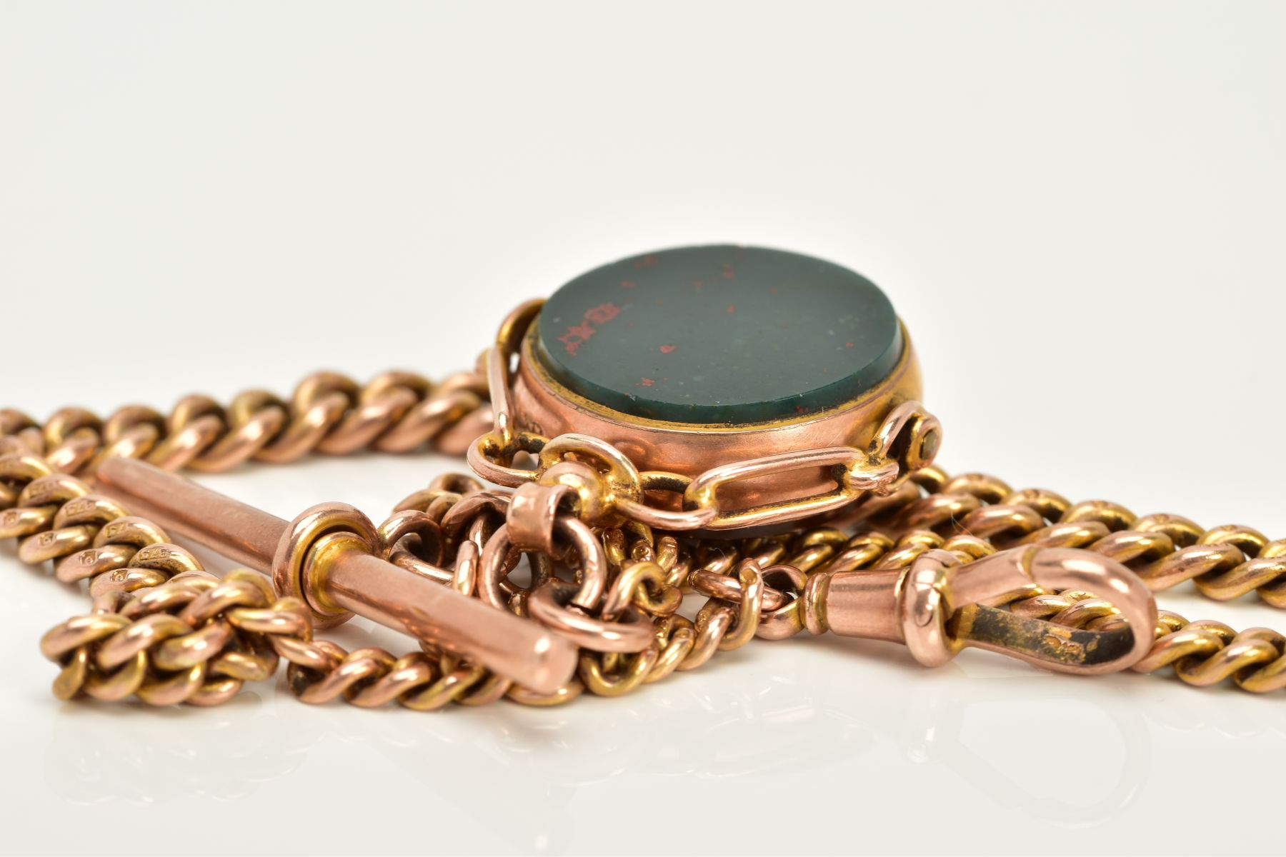 A 9CT GOLD ALBERT CHAIN AND FOB, the swivel fob of circular design, swivels to reveal bloodstone and - Image 4 of 4