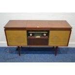 A VINTAGE BUSH VALVE RADIO, type srg 51, with a Garrard turntable, width 122cm (PAT fail due to no