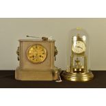 A LATE 19TH CENTURY FRENCH BRASS CASED MANTEL CLOCK, lion mask ring handles to sides, engraved