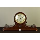 AN EARLY 20TH CENTURY MAHOGANY CASED DOME TOP MANTEL CLOCK WITH SCROLLED SIDES, silvered dial with
