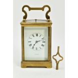 A BRASS CASED STRIKING CARRIAGE CLOCK, white dial and Roman numerals, dial signed 'A Jack & Co,