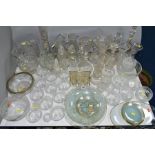 A QUANTITY OF GLASSWARE, including nine decanters, assorted vases, fruit dishes, jugs, vases, Chance
