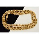 A YELLOW METAL ROPE TWIST CHAIN, fitted to a spring clasp, stamped 750, length 720mm, approximate