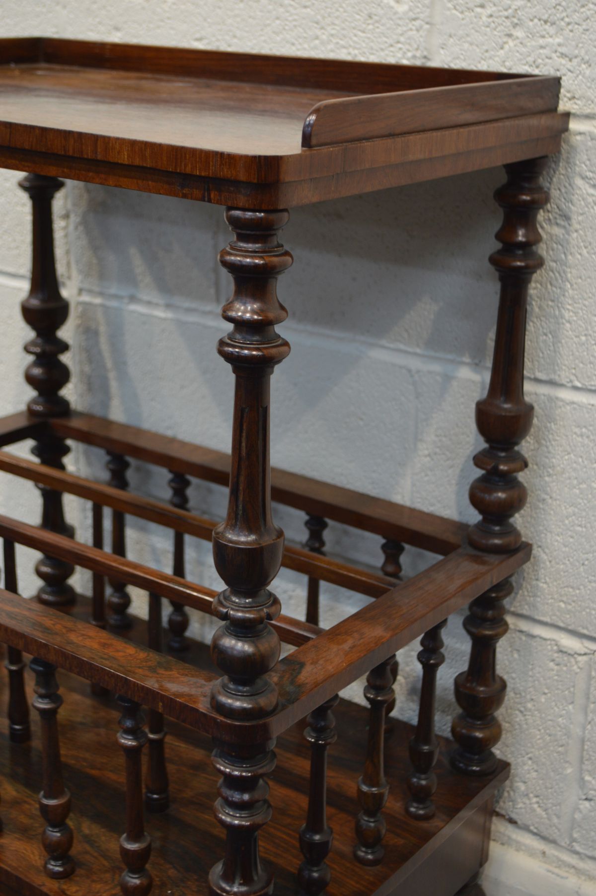 A VICTORIAN ROSEWOOD CANTERBURY, with a gallery top, turned and fluted supports, three divisions - Image 2 of 3