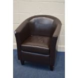 A BROWN LEATHER TUB CHAIR
