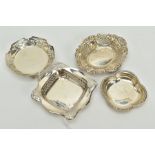 FOUR SMALL SILVER BON BON DISHES, to include a George V dish of an openwork square design,
