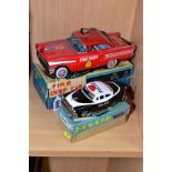 A BOXED ICHIKO (JAPAN) TINPLATE FRICTION DRIVE OLDSMOBILE FIRE CHIEF CAR, complete with moveable