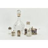 A SELECTION OF SILVER MOUNTED CUT GLASS WEAR, to include a silver mounted cut glass decanter,