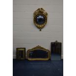 A REGRENCY STYLE GILT WOOD CONVEX WALL MIRROR, with an eagle pediment, together with a gilt wood