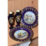 A PAIR OF 19TH CENTURY SEVRES STYLE CABINET PLATES, gilt and jewelled borders on a blue ground,