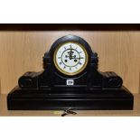 A LATE 19TH CENTURY BLACK SLATE MANTEL CLOCK OF DOMED FORM, the white enamel dial (s.d) with Roman