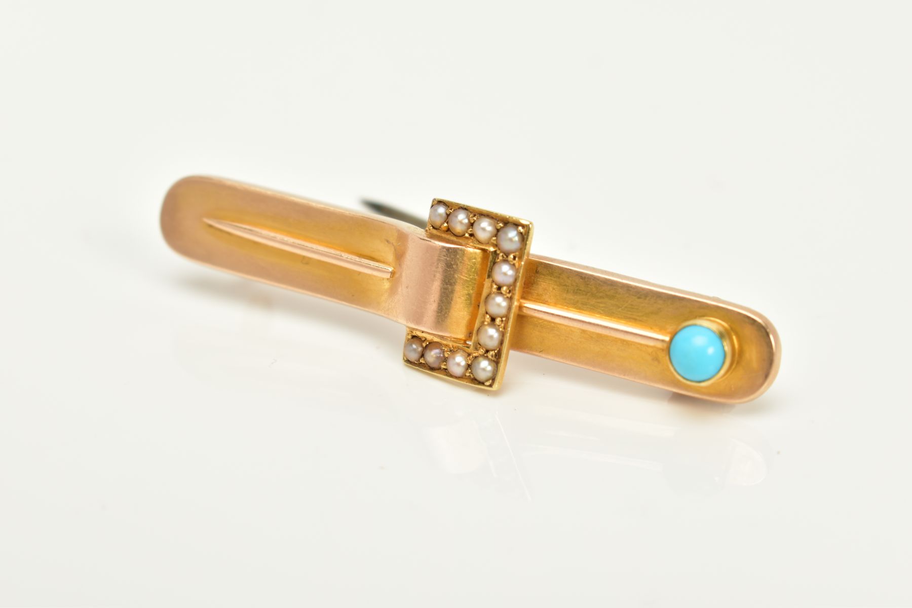 A YELLOW METAL BROOCH, in the form of a belt, set with split pearls and a turquoise cabochon, length - Image 2 of 3