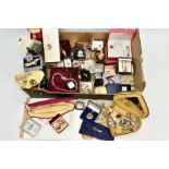 A BOX OF COSTUME JEWELLERY to include various base metal brooches, rings, wristwatches, necklaces,