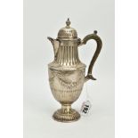 A LATE VICTORIAN SILVER HOT WATER JUG, of urn form, domed cover, fluted bands throughout, the body