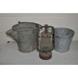 AN UNUSUAL SPOUTED GALVANISED BUCKET, diameter 31cm x height 32cm, a modern galvanised bucket and