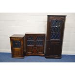 AN OAK LEAD GLAZED TWO DOOR BOOKCASE (sd), a similar corner cupboard and a hi fi cabinet (3)